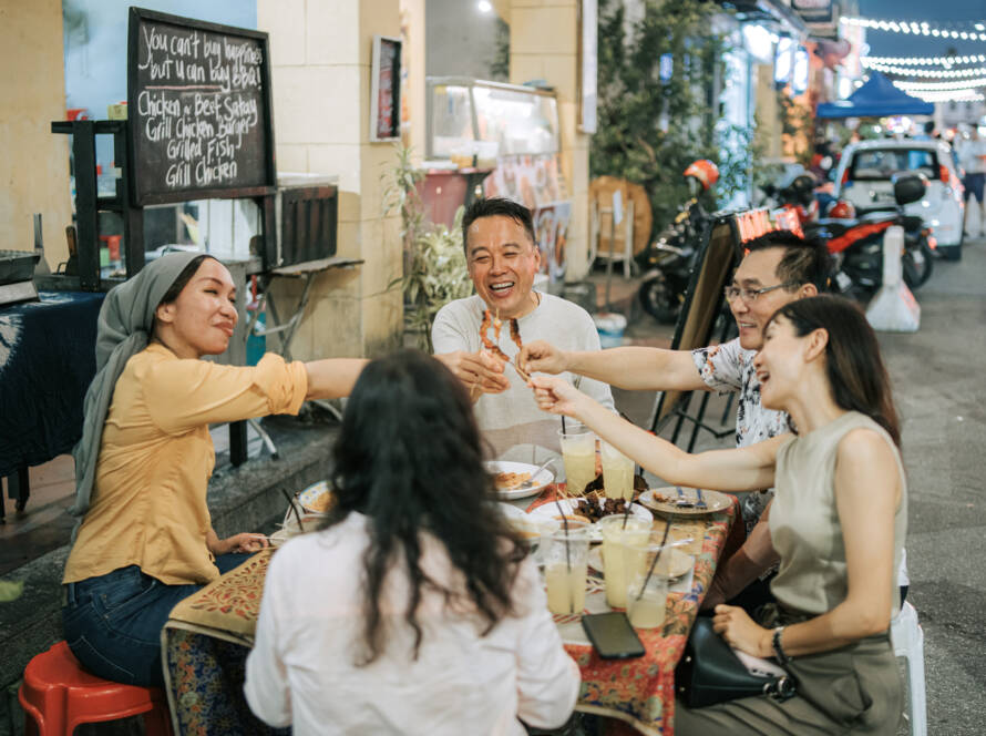 Family eating street foods